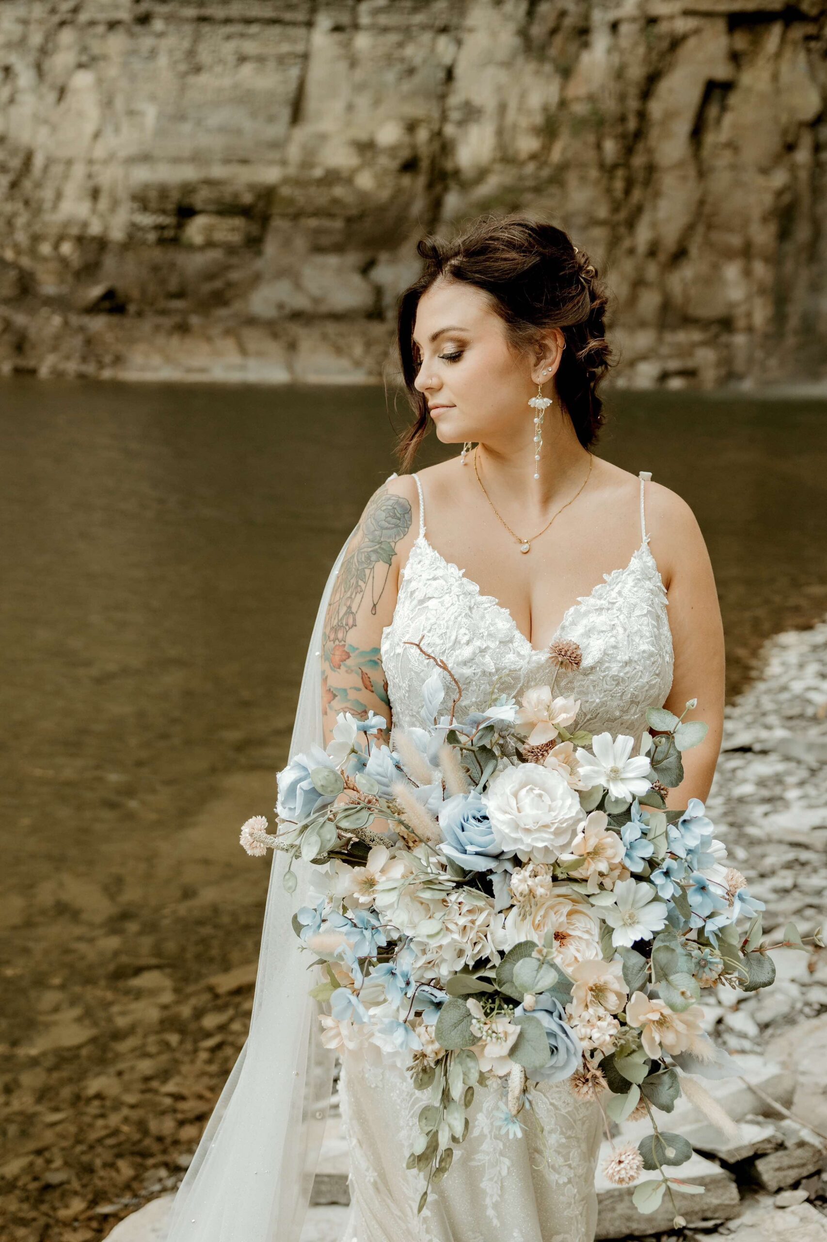 bride holding wedding bouquet 